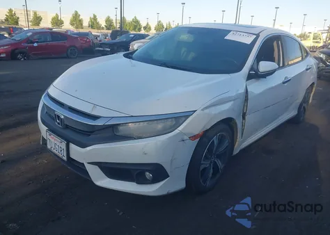 2017 Honda Civic Touring from USA, damaged, VIN 2HGFC1F9XHH658317